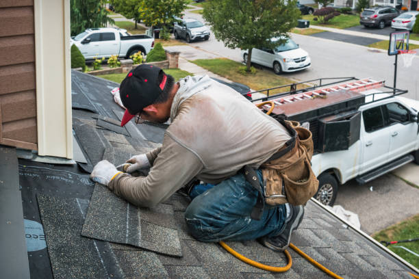 Professional Storm Damage Roof Repair technician working in Verona, VA